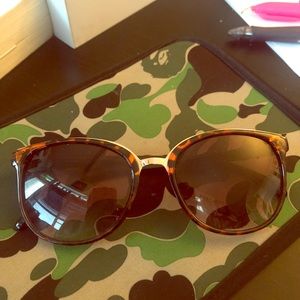 Gold and tortoise shell sunglasses